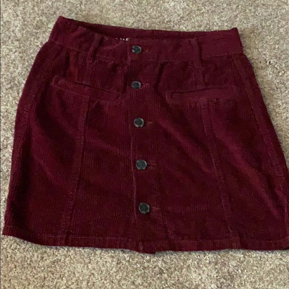 red rubber high rise jean skirt